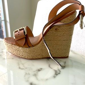 Wedge heel platform with leather upper ankle strap buckle. Never worn. Perfect